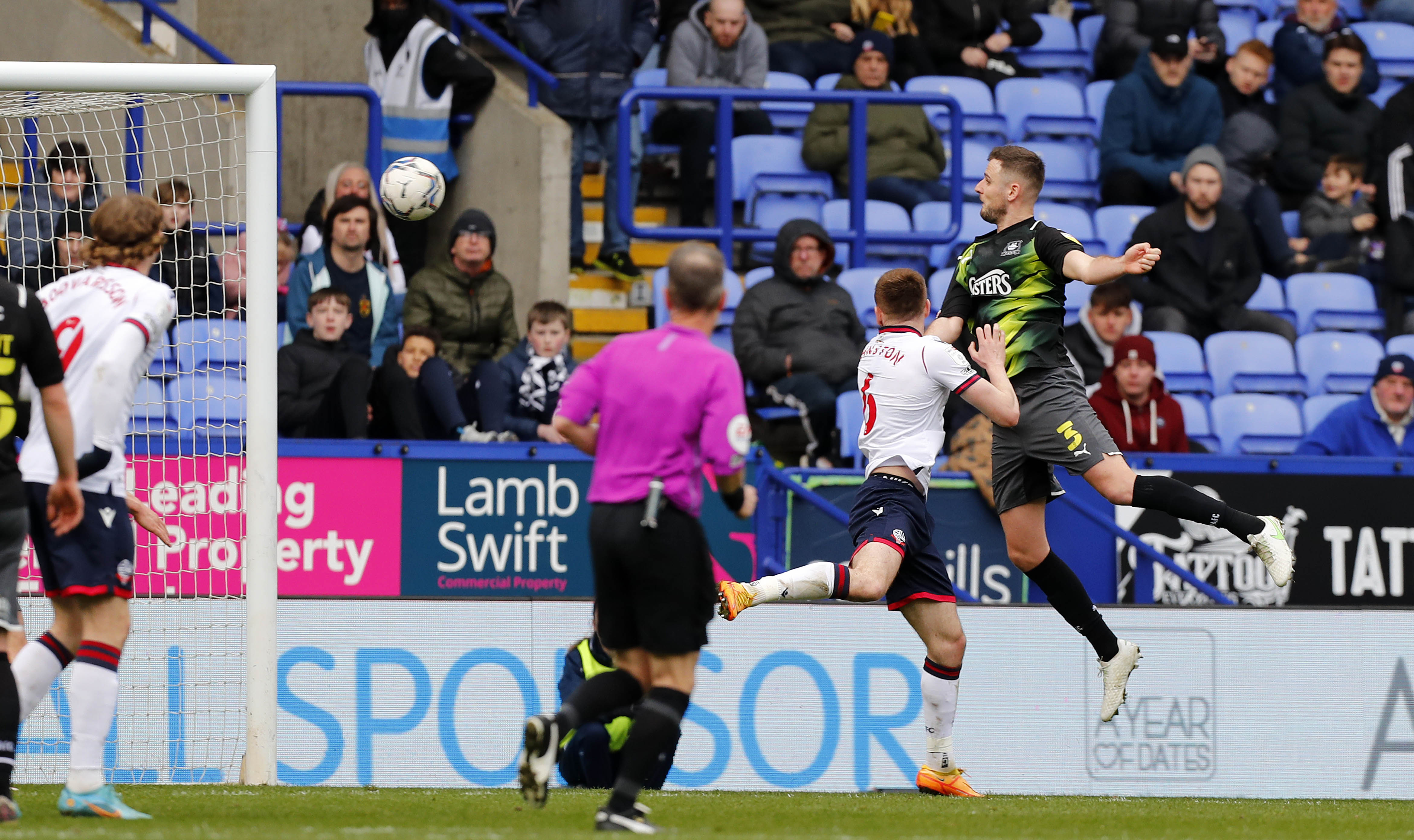 Macaulay Gillesphey heads the winner at Bolton