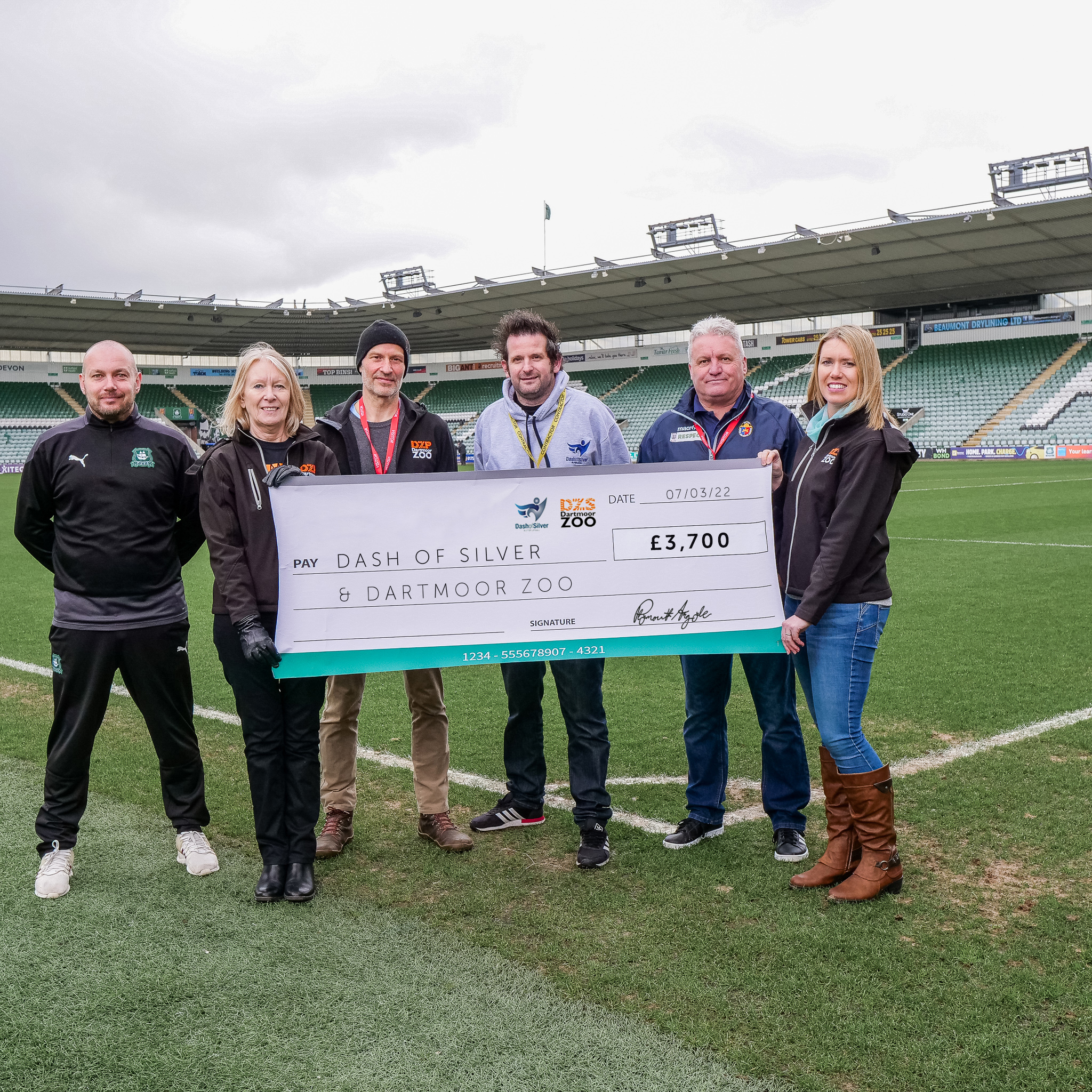 Partner charities receive cheque at Home Park