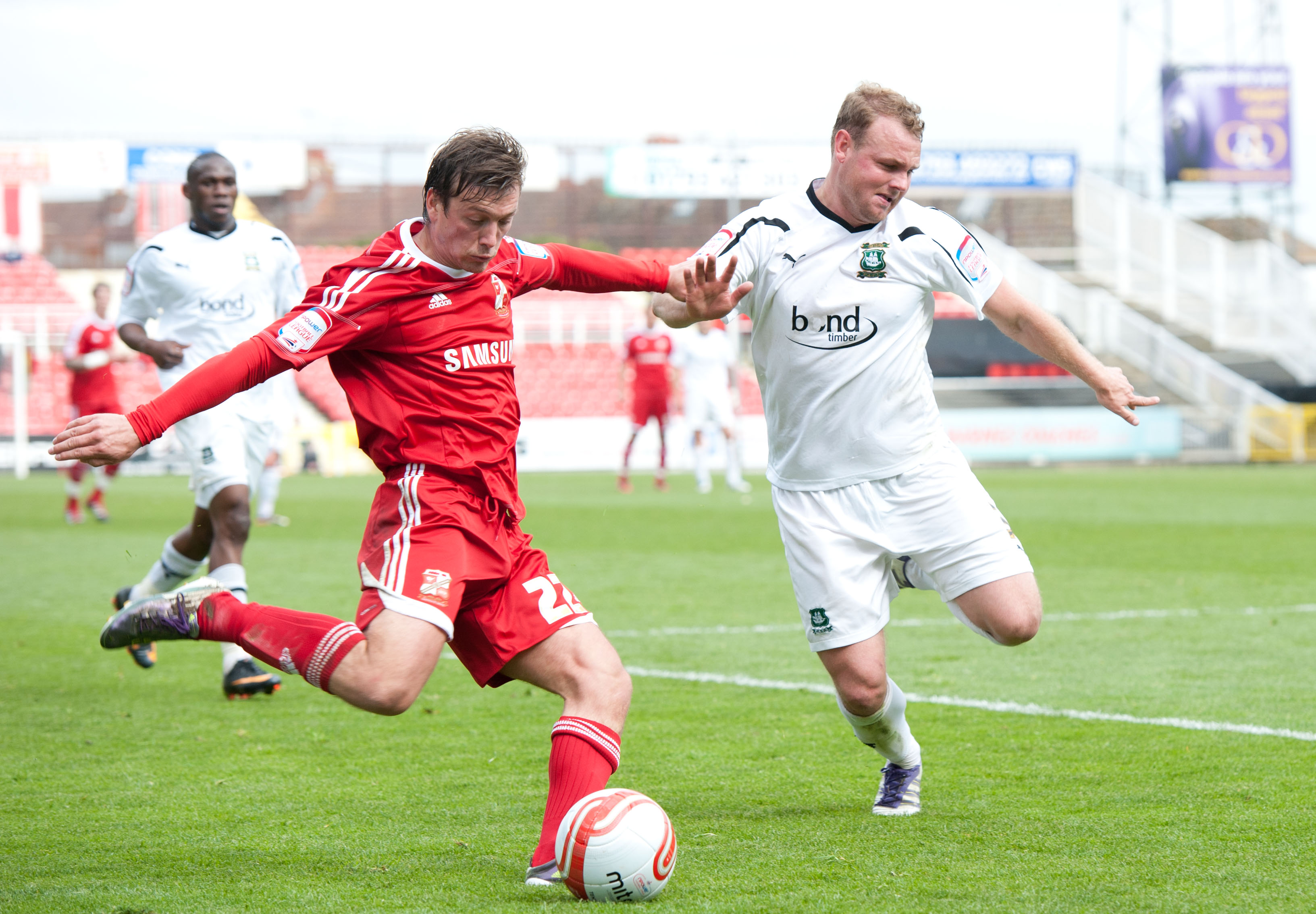 Robbie Williams wearing a Bond Timber sponsored Argyle kit in 2012