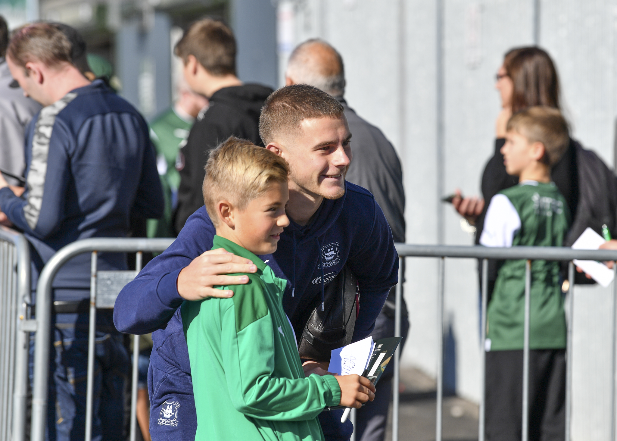 Adam Randell with young fan