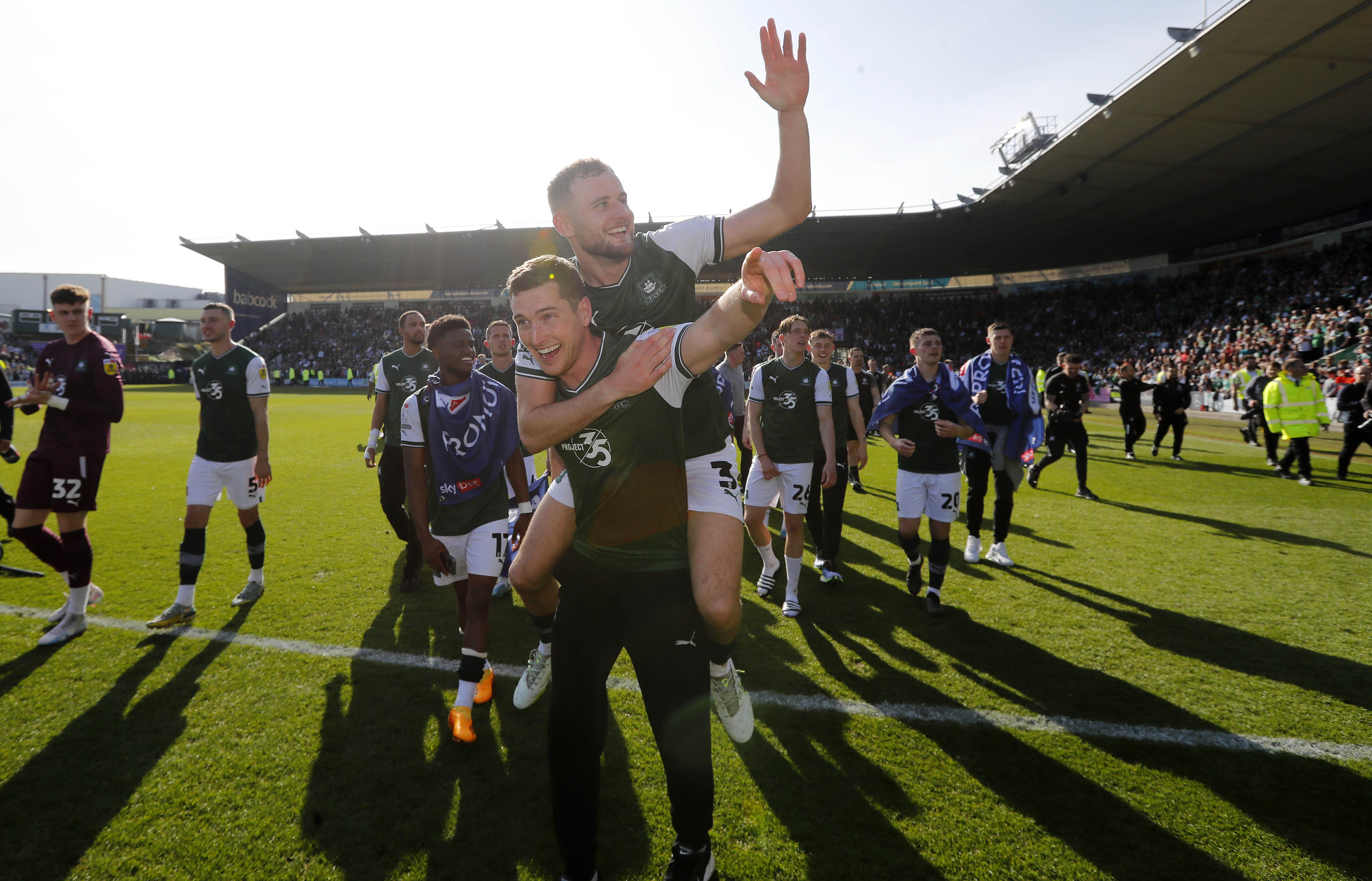 Macaulay Gillesphey and Conor Grant celebrate promotion