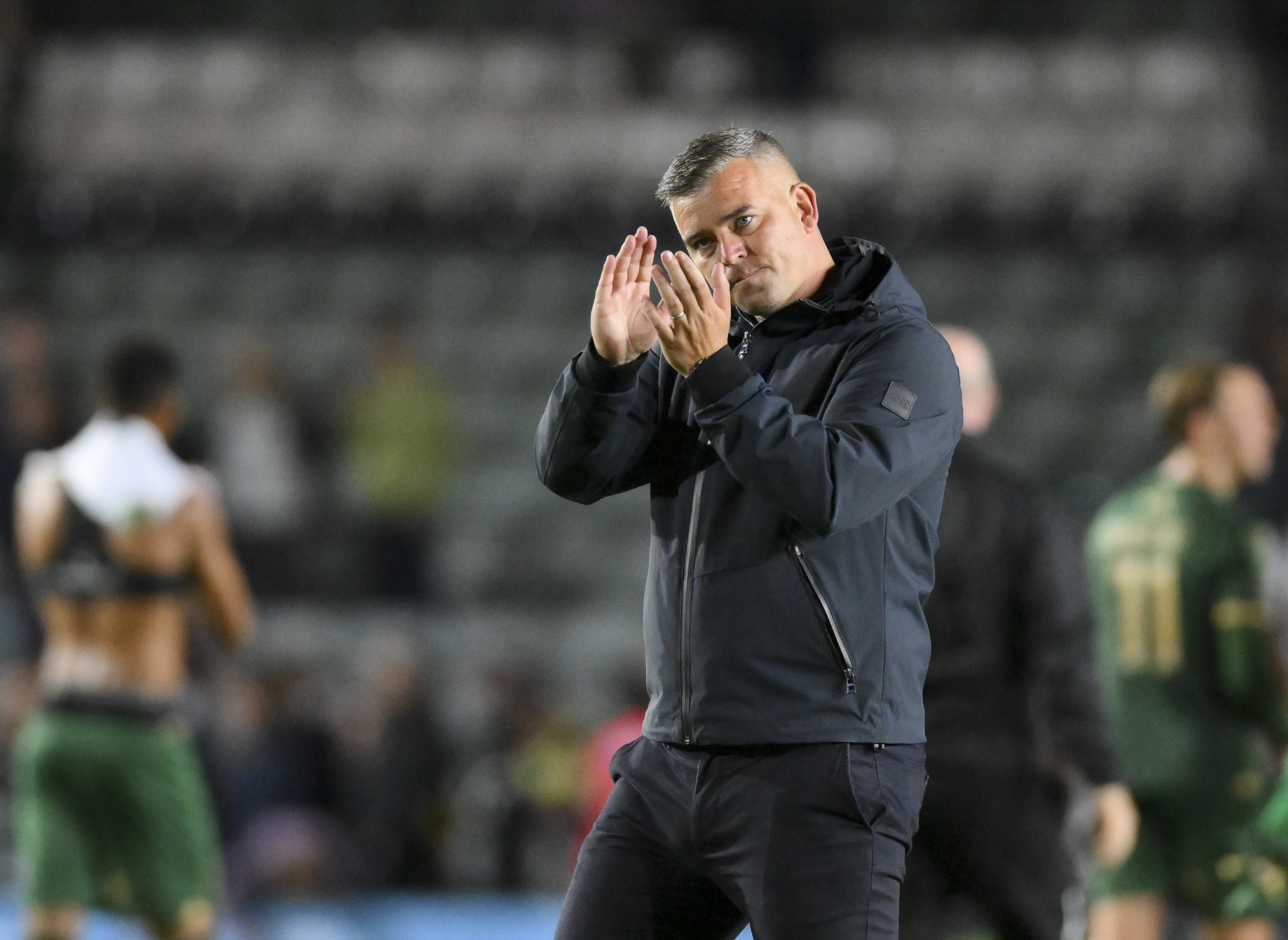 Steven Schumacher applauding