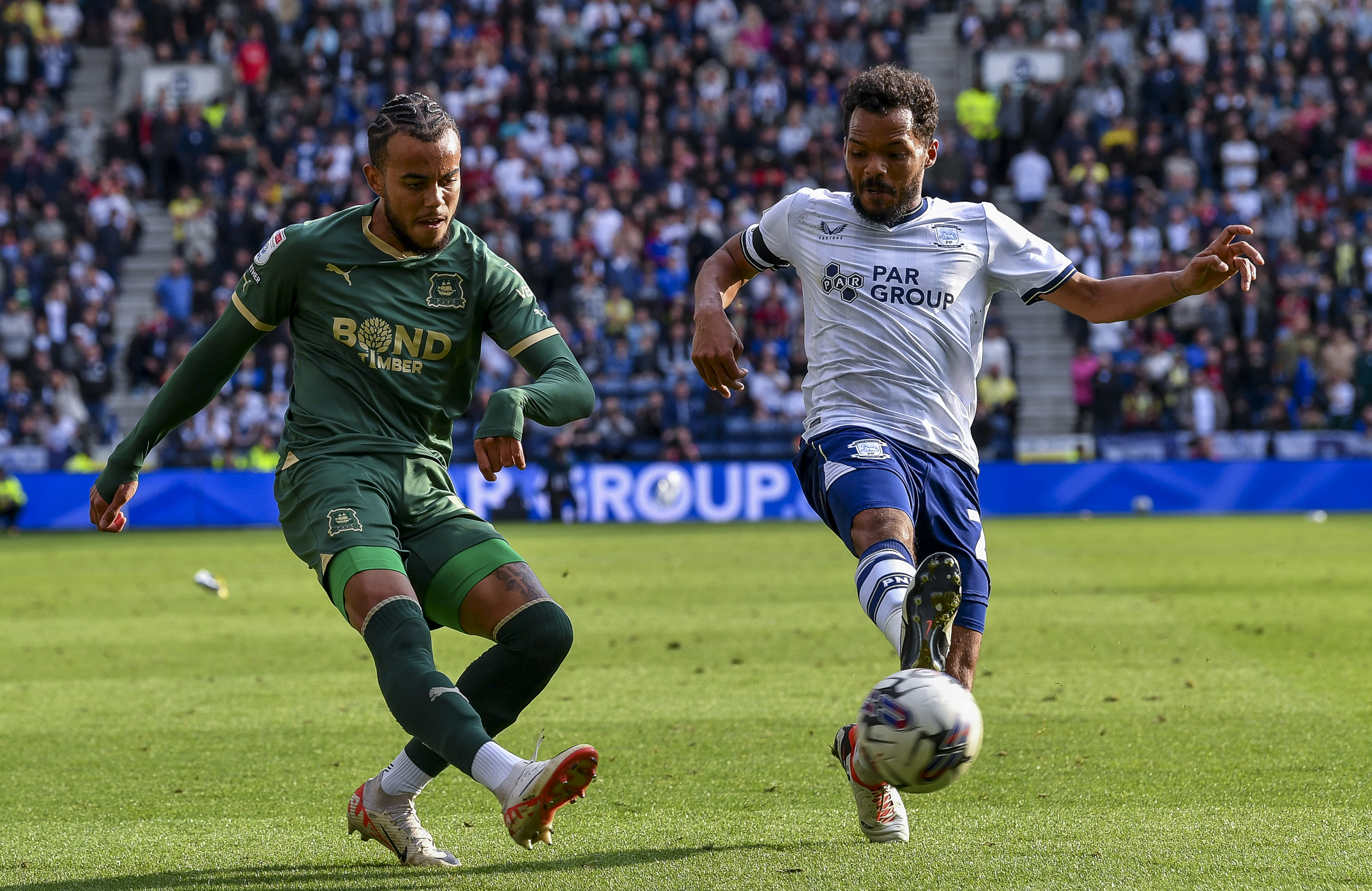 Tyreik Wright crosses the ball against Preston North End