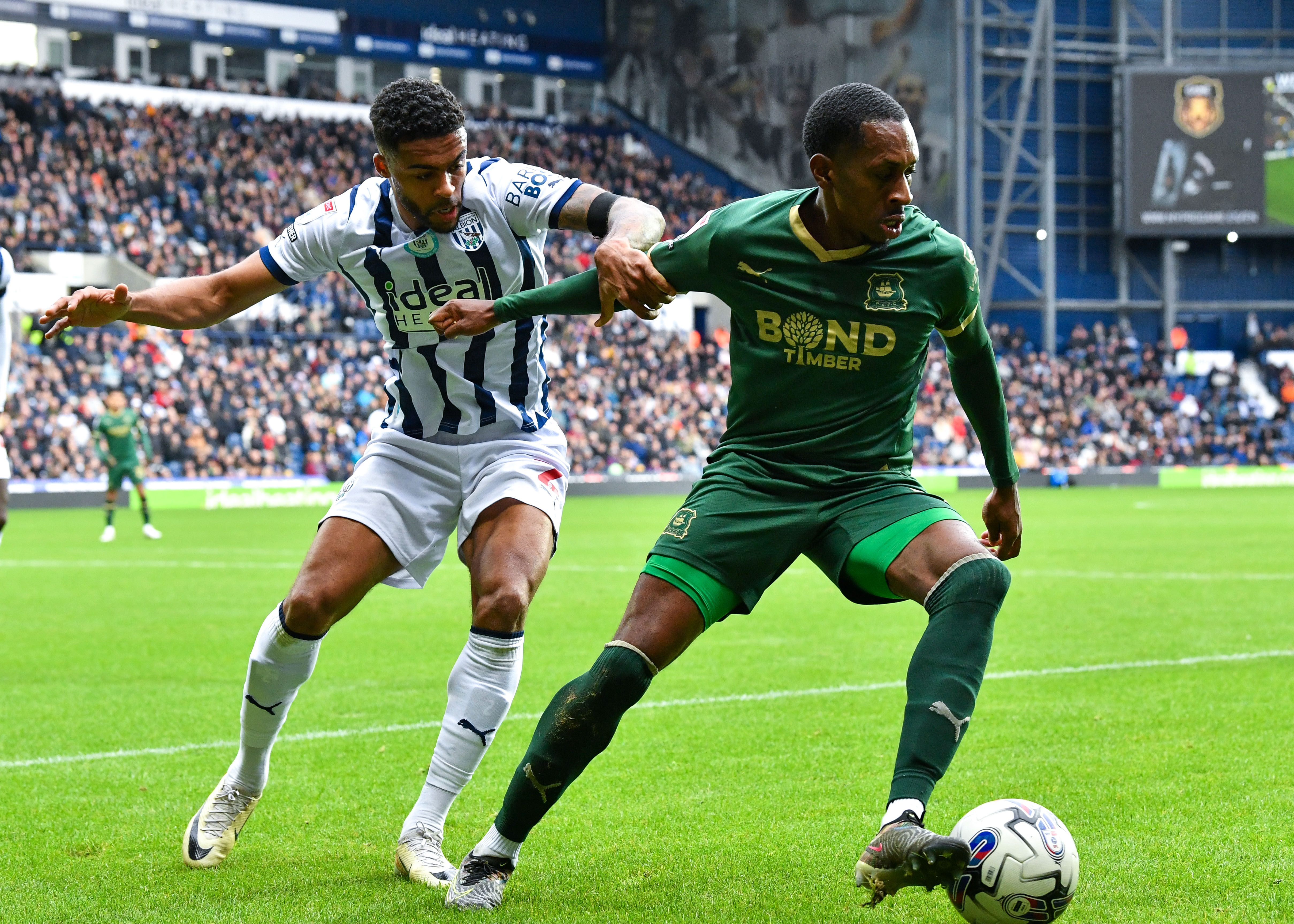 Mickel Miller shields the ball