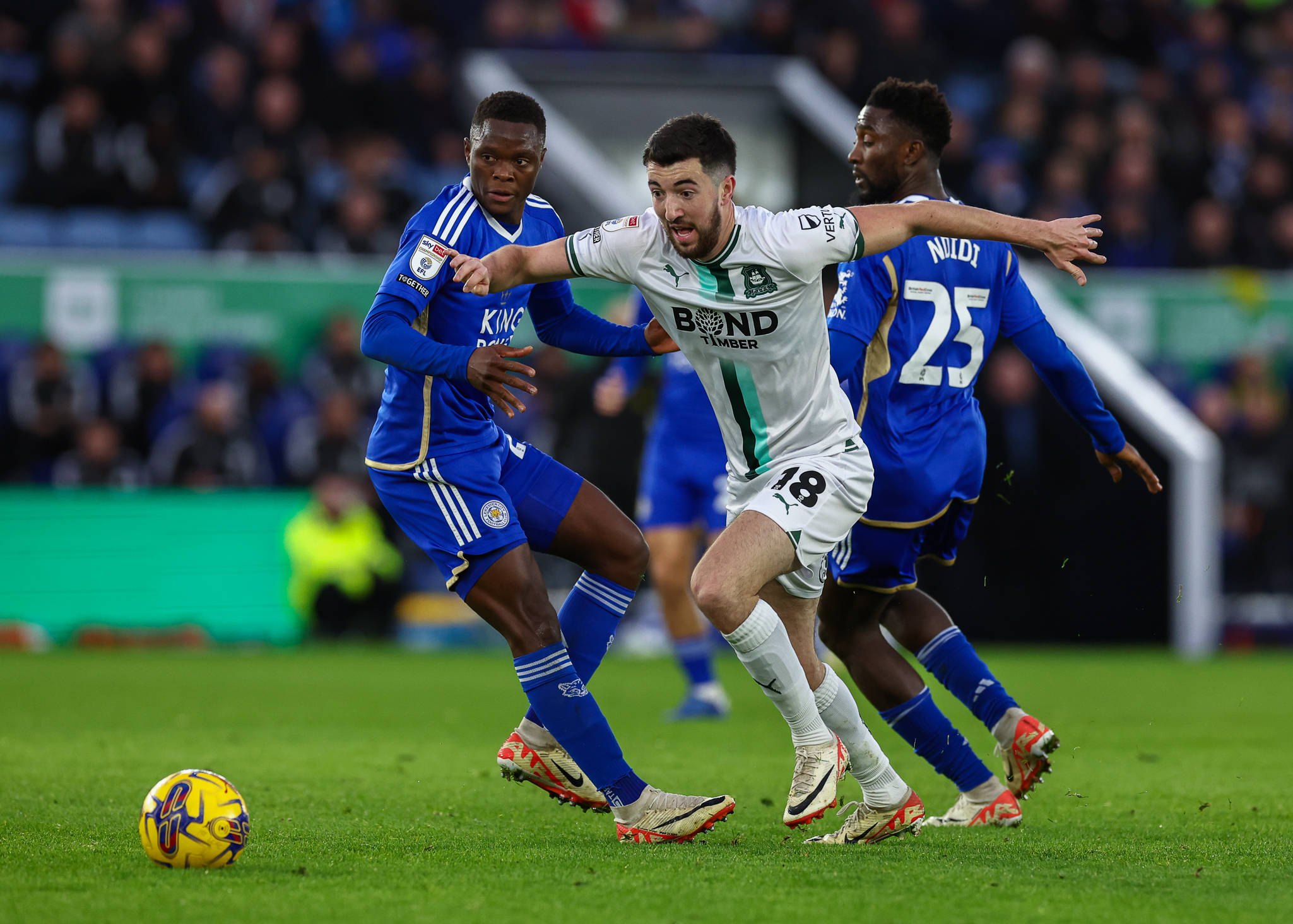 Finn Azaz drives the ball forward against Leicester City