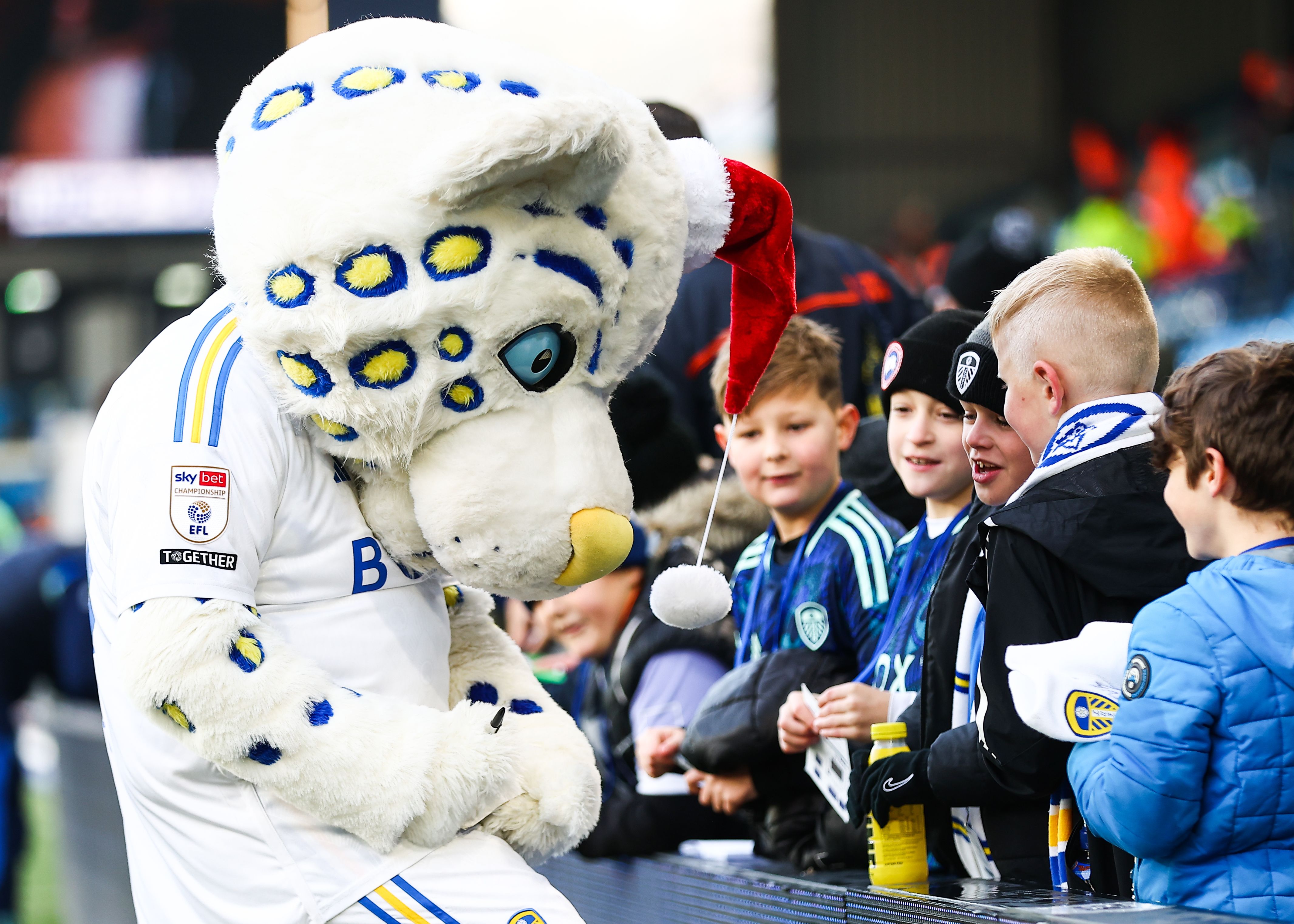 The Leeds United mascot signing autographs
