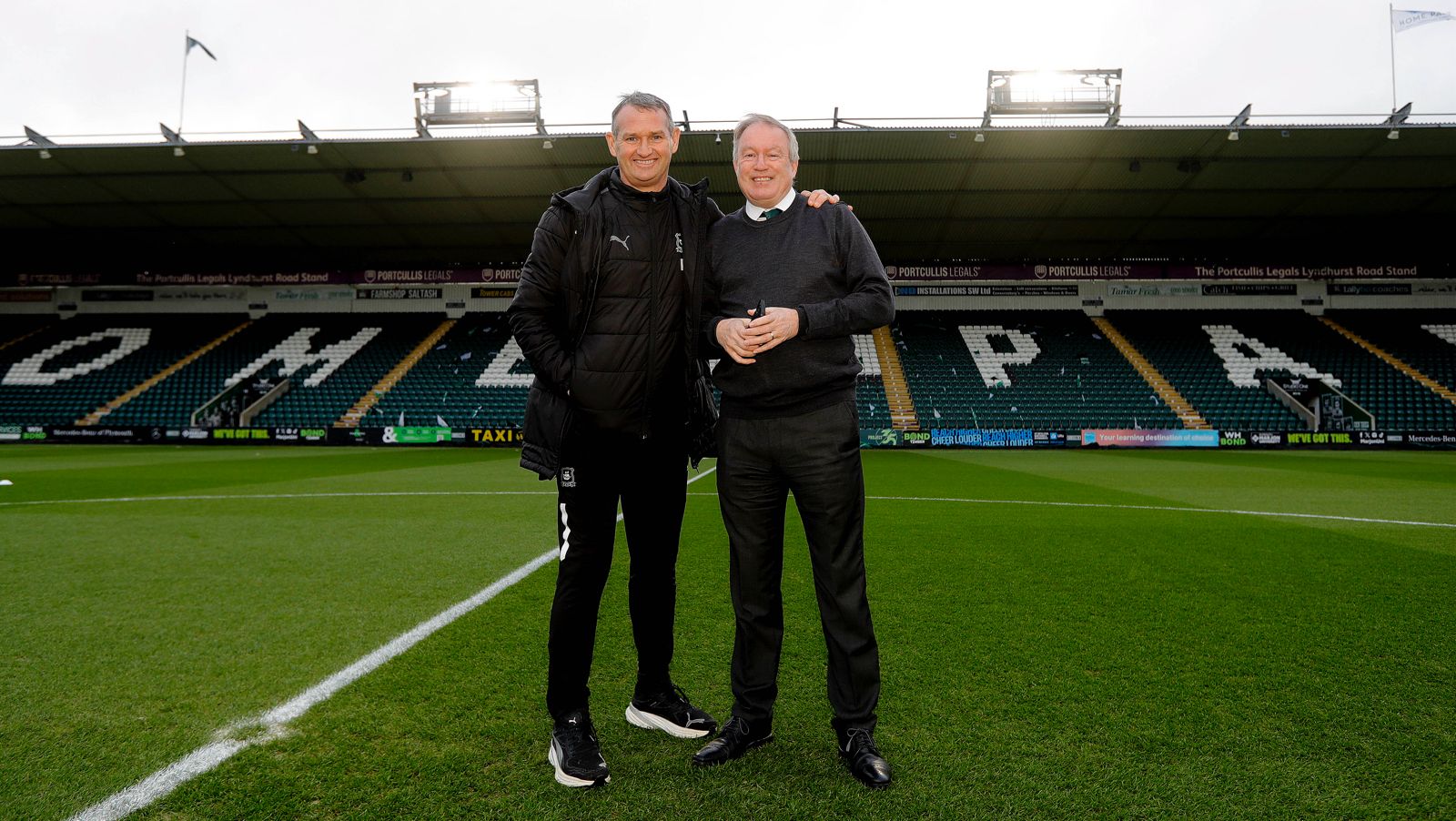 Kevin Nancekivell and Neil Dewsnip on the pitch at Home Park