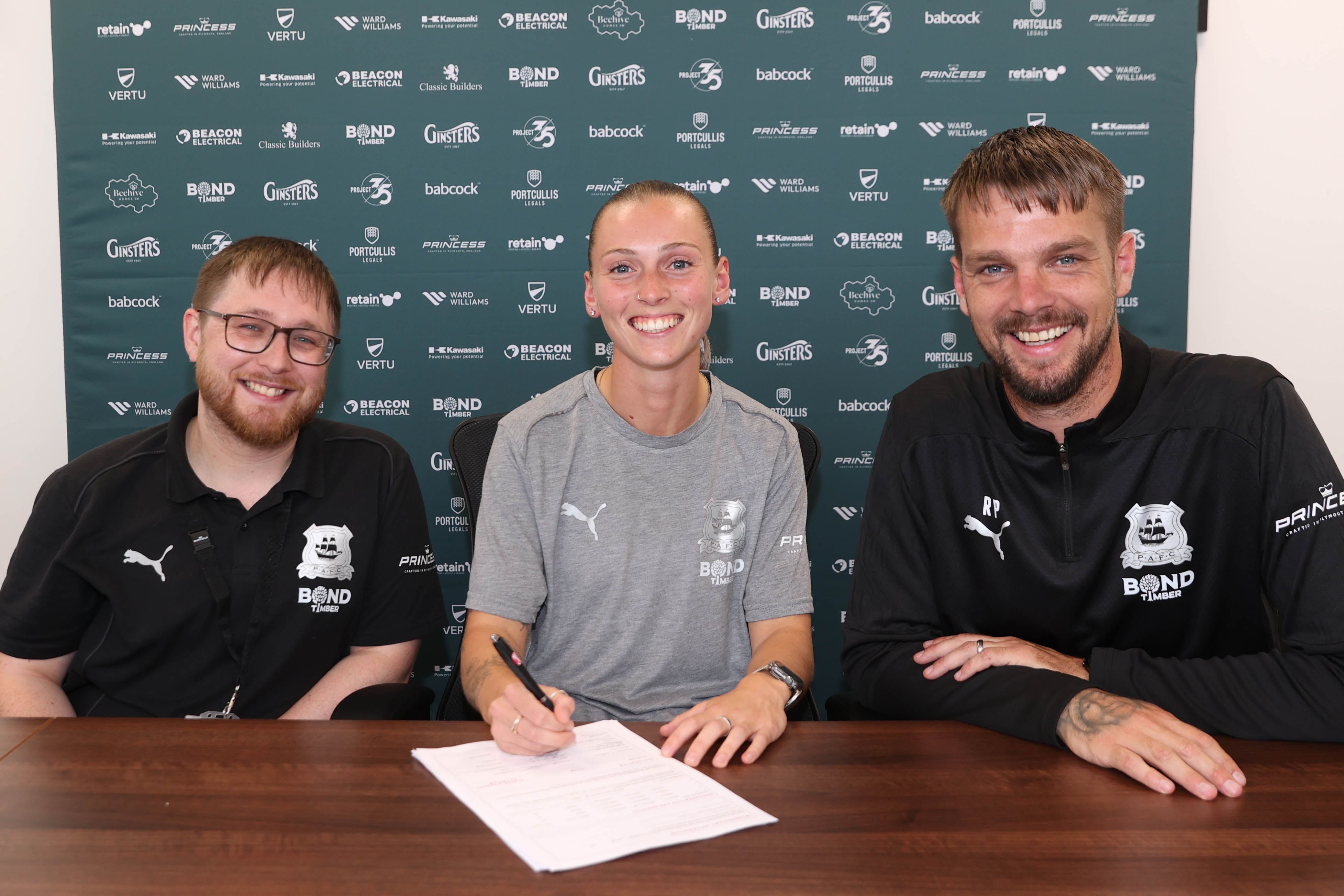 Charlotte Whitmore signing contract