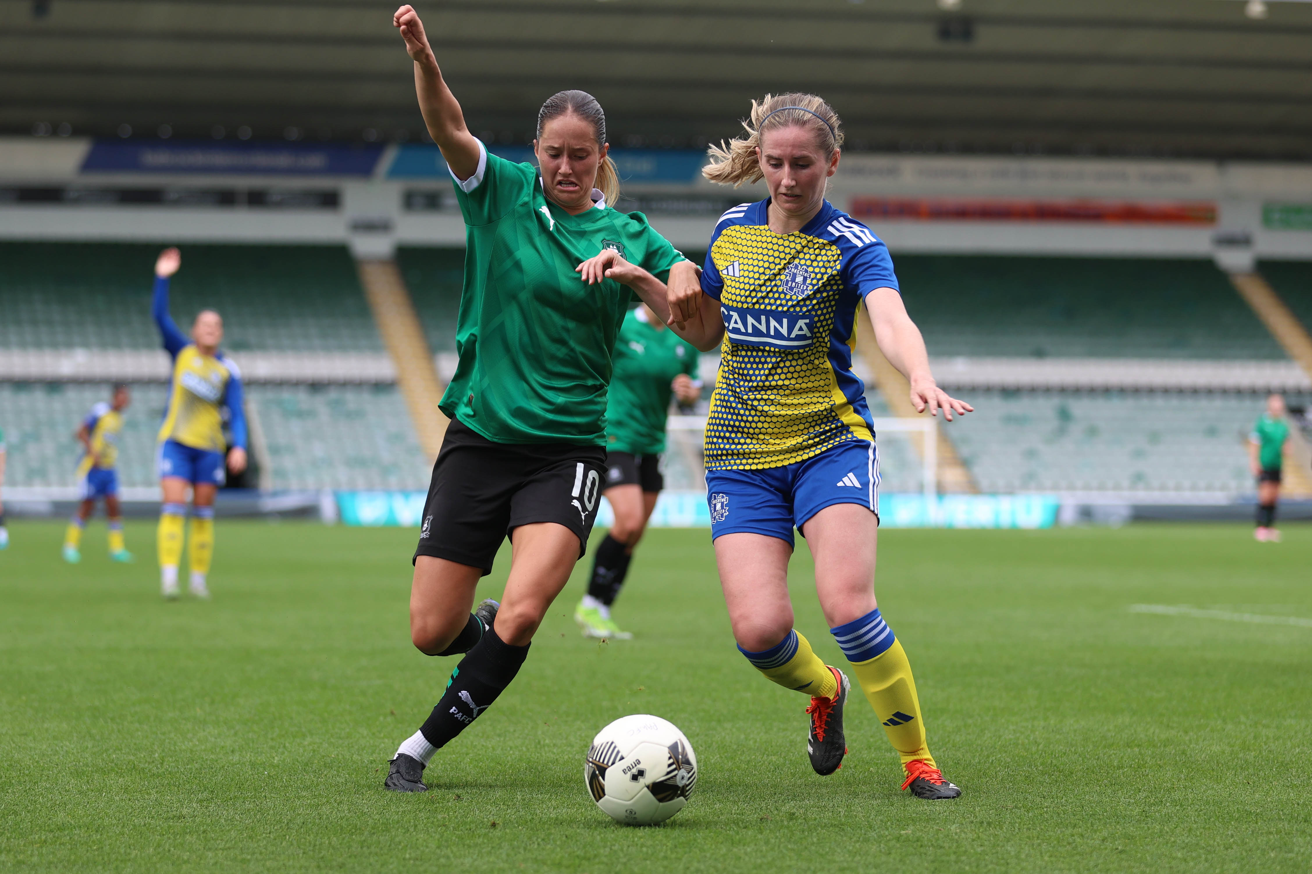 Georgia Wilson battles for the ball