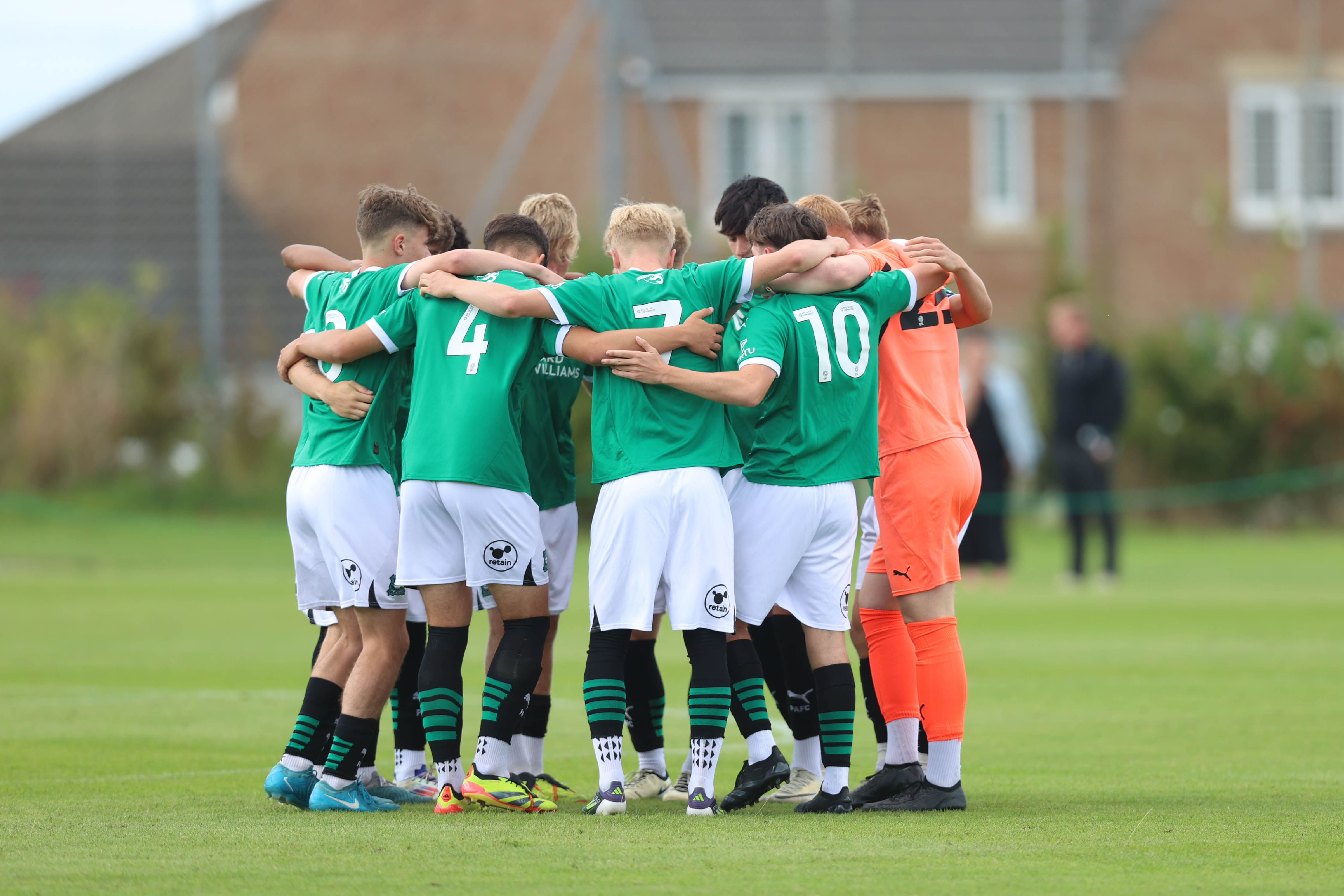 Under-18s huddle