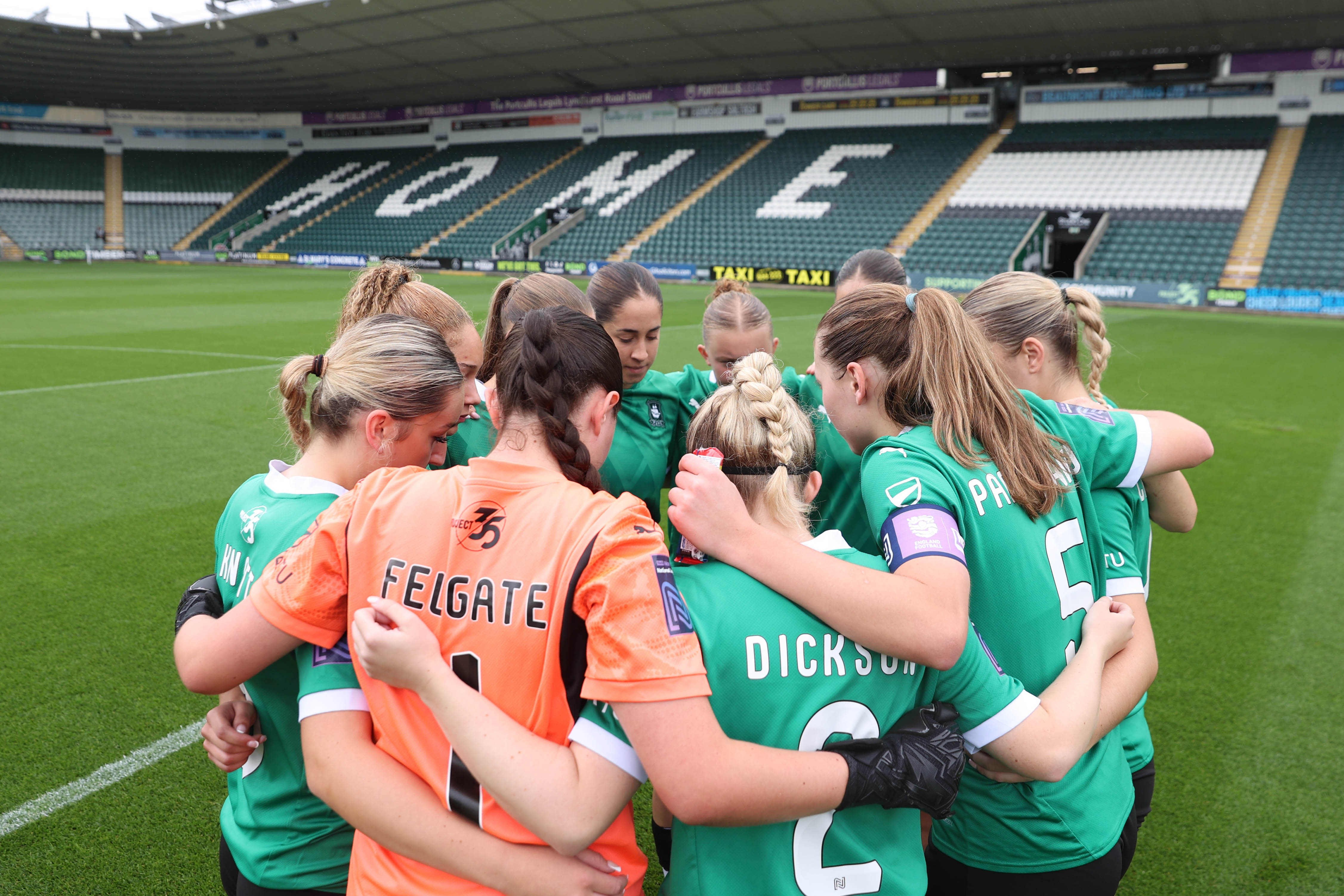 Argyle women huddle