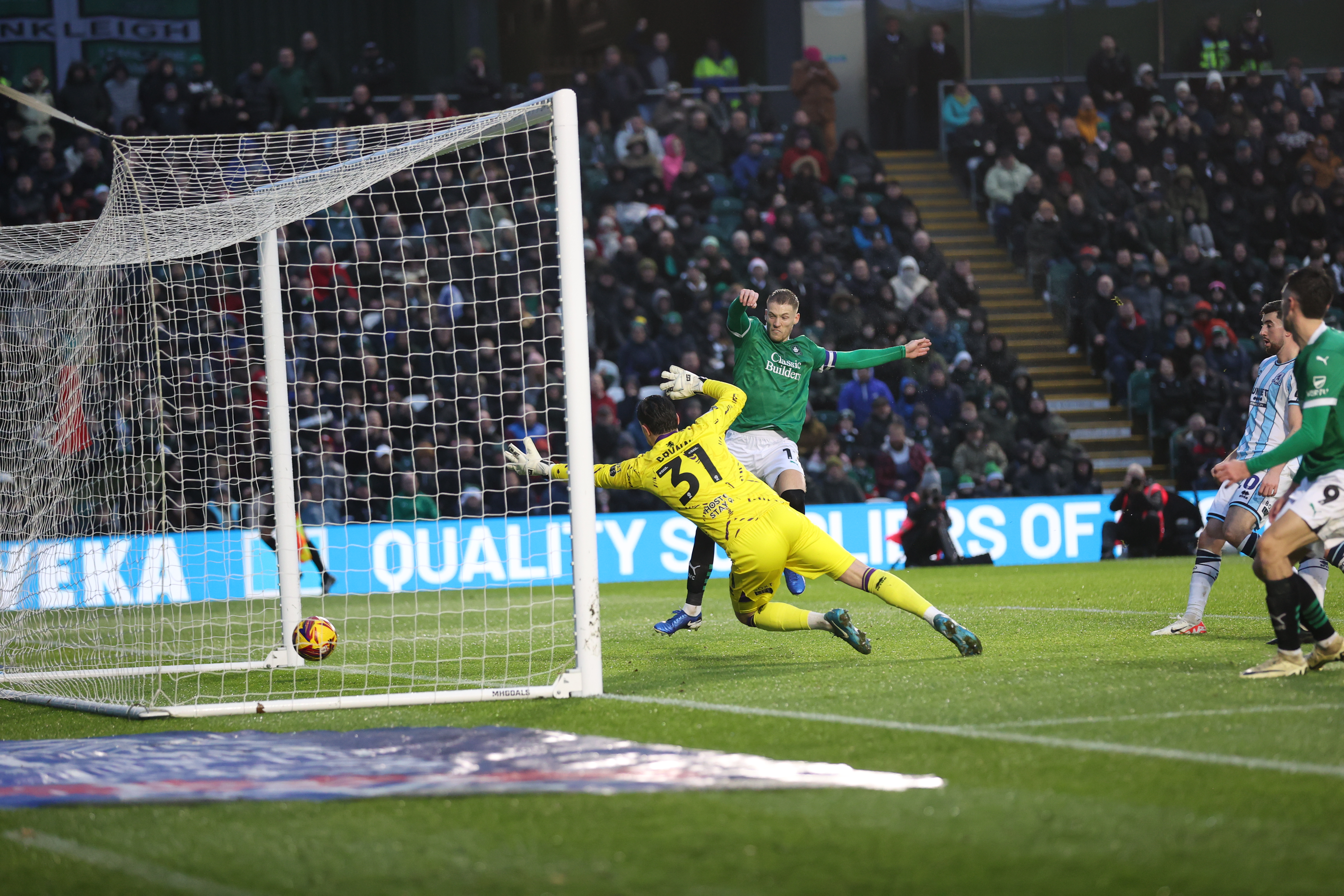 Lewis Gibson scores