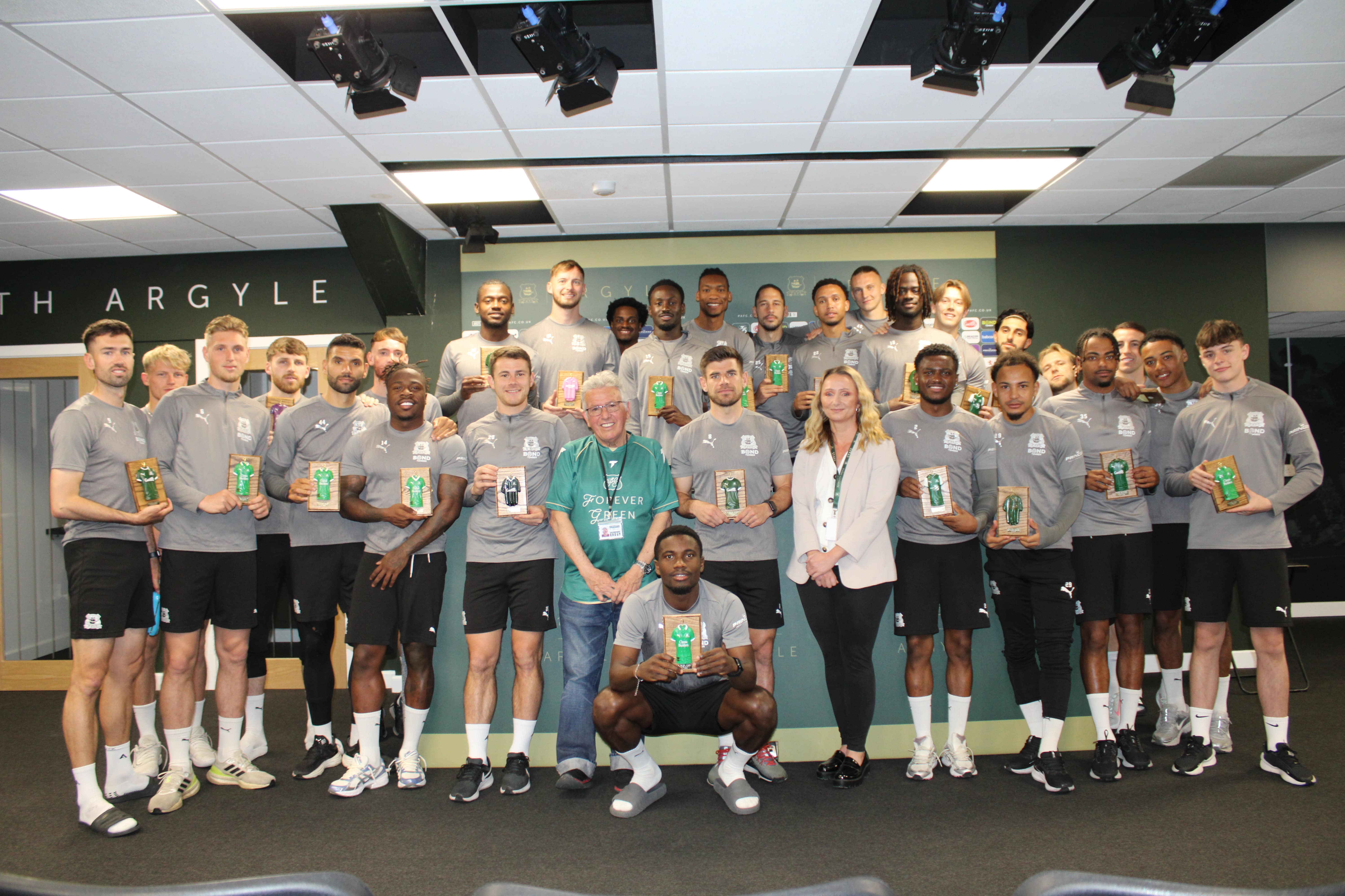 Players receive Forever Green Plaques