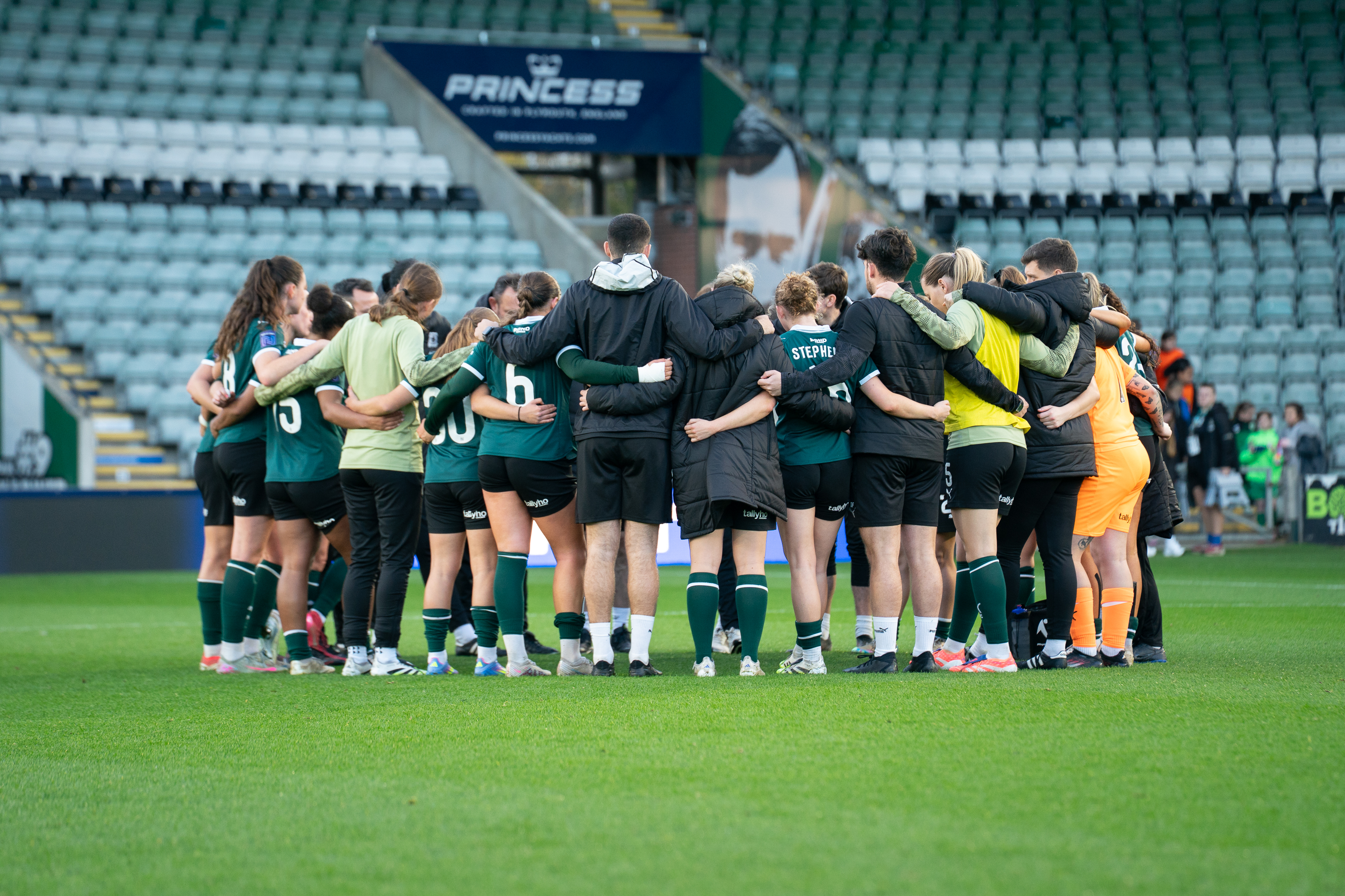 Argyle Women team huddle.