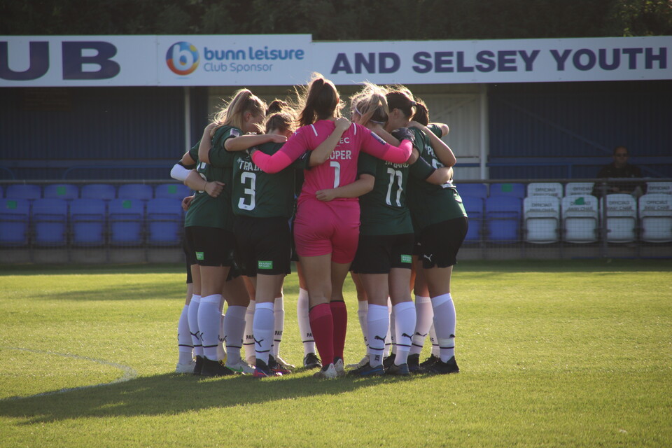 Women's Team Huddle