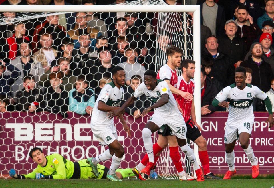 Panutche Camara celebrates scoring at Cheltenham