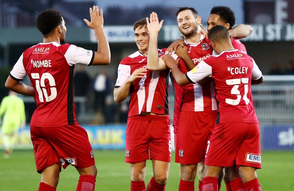 Exeter celebrate scoring