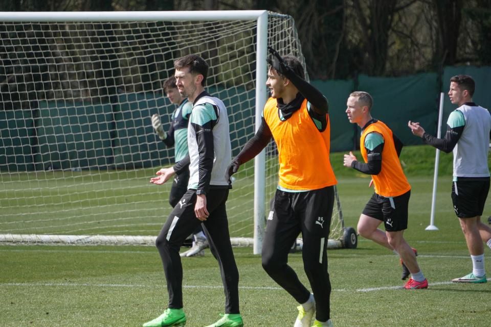 Ashley Phillips signals for the ball.