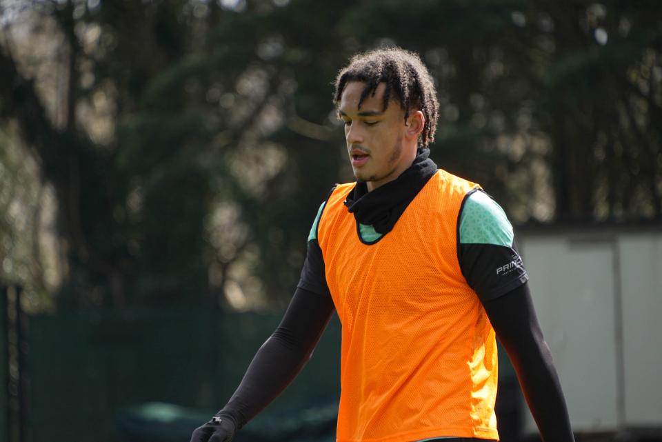 Ashley Phillips walks during a training drill.