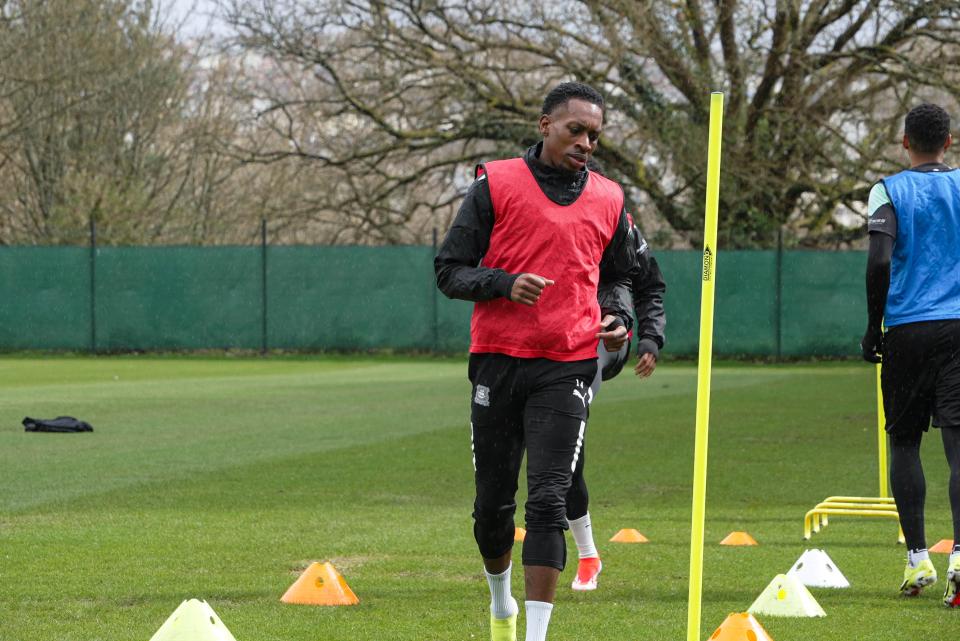 Mickel Miller warms up.