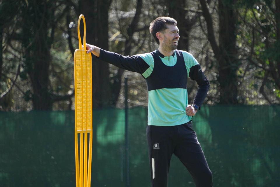 Ryan Hardie watches on.