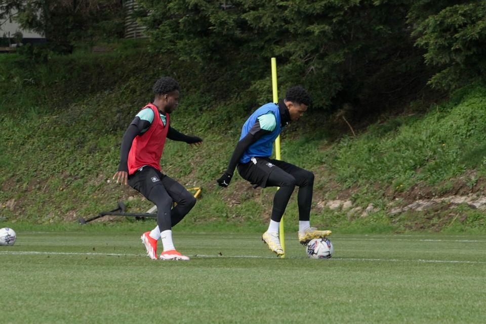 Bali Mumba moves in for a tackle on Lino Sousa.