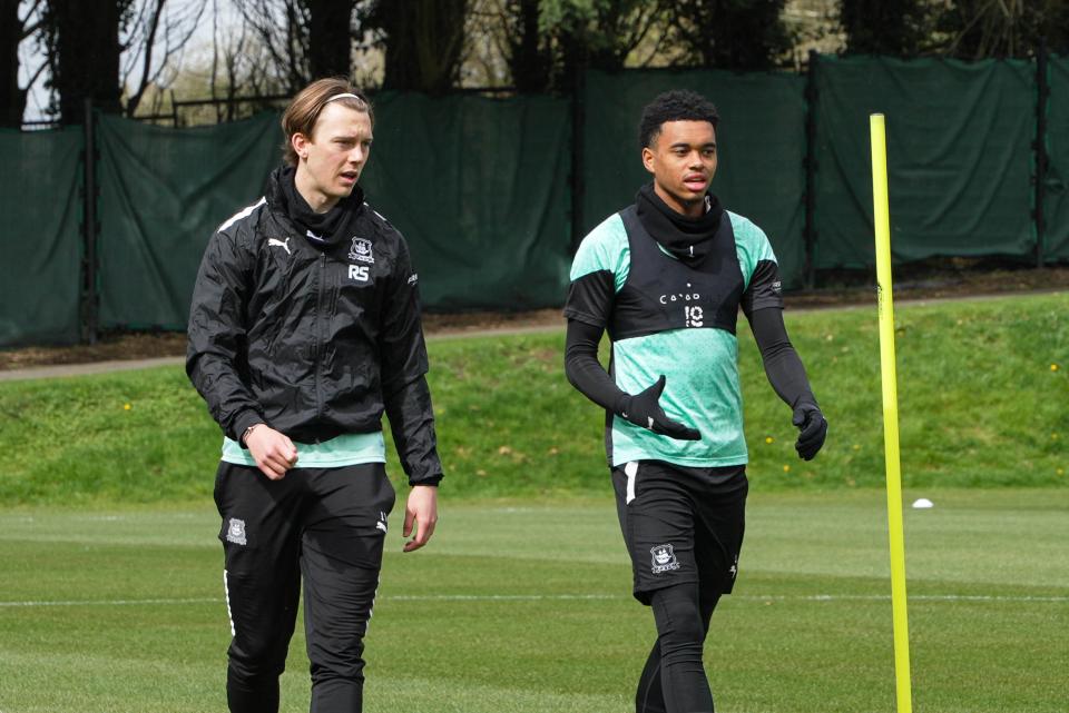 Callum Wright and Lino Sousa walk into training.