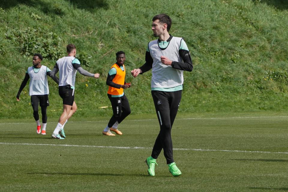 Ryan Hardie runs during a drill.