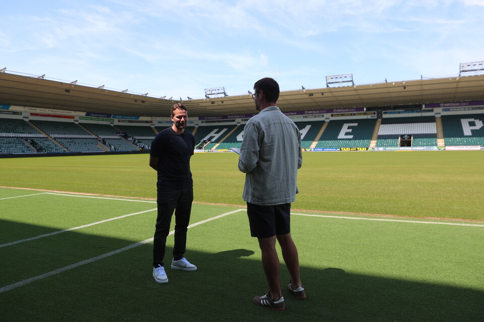 Tom Cleverley being interviewed by Charlie Price 