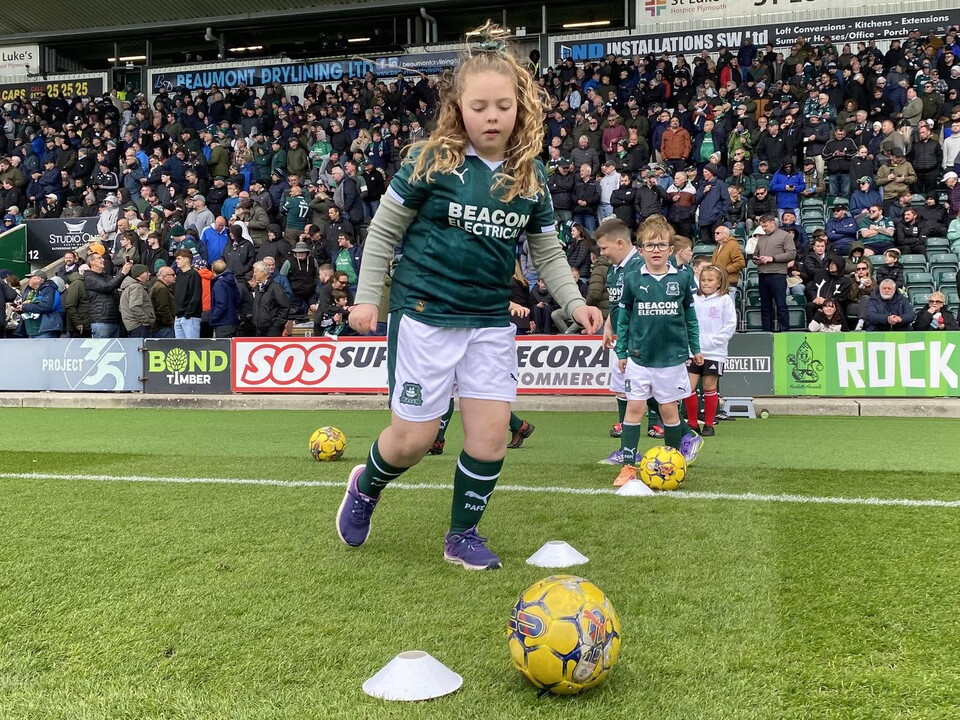 Mascot on the pitch at Home Park