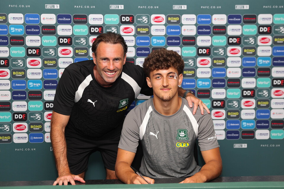 Deniz Doru and Under-18s Head Coach Jamie Lowry smile for a photo.