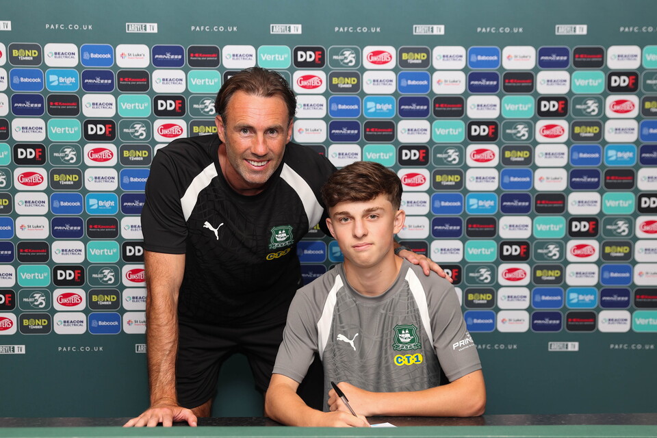 Joel Tolcher and Under-18s Head Coach Jamie Lowry smile for a photo.