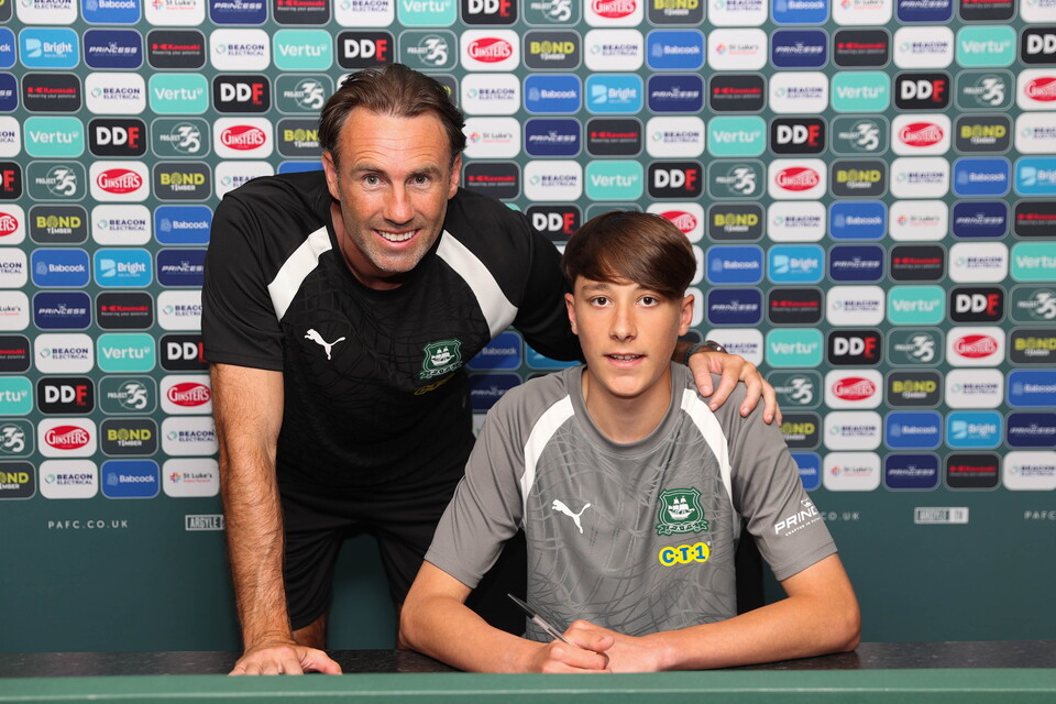 Dylan Williams and Under-18s Head Coach Jamie Lowry smile for a photo.