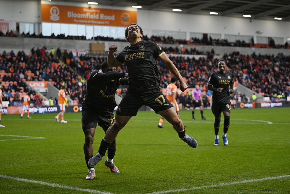 Caleb Watts celebrates after scoring against Blackpool
