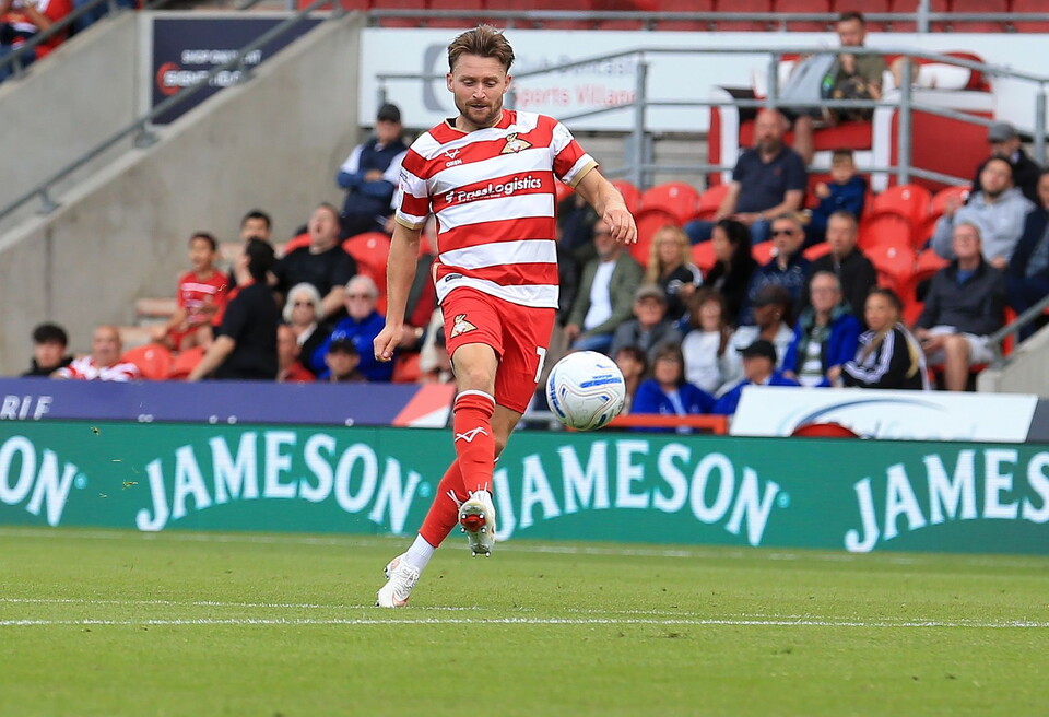 Alfie May playing for Doncaster Rovers
