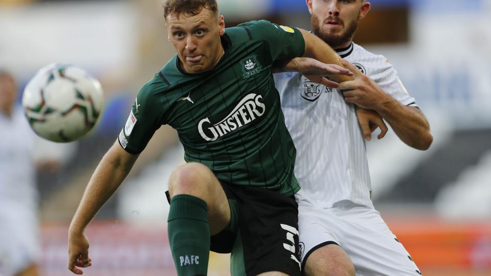 Luke Jephcott holding off Swansea