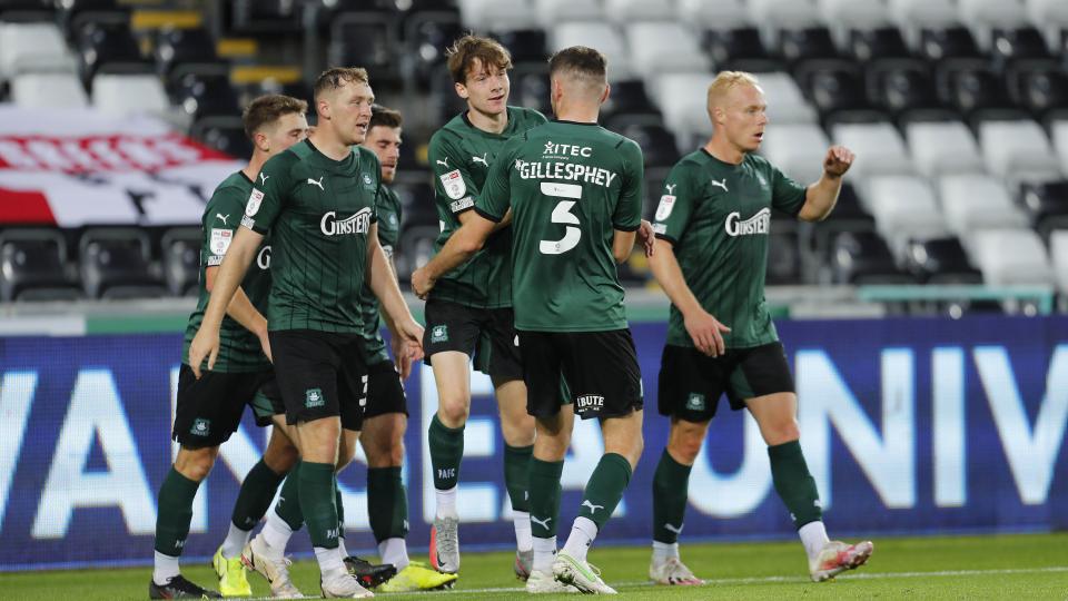 The players celebrate Rhys Shirley's goal