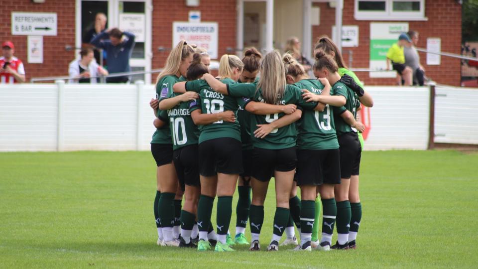 Women's Team Huddle