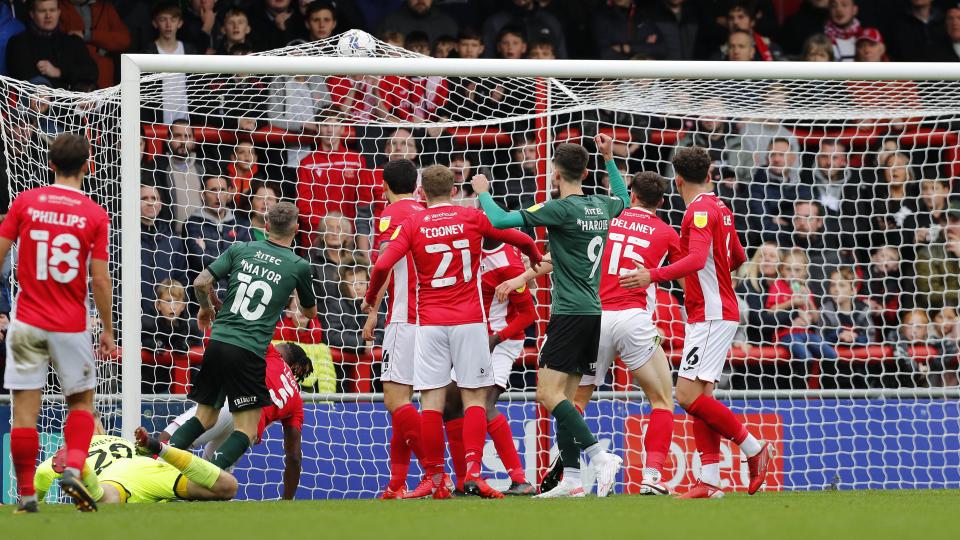 Danny Mayor scores the equaliser at Morecambe