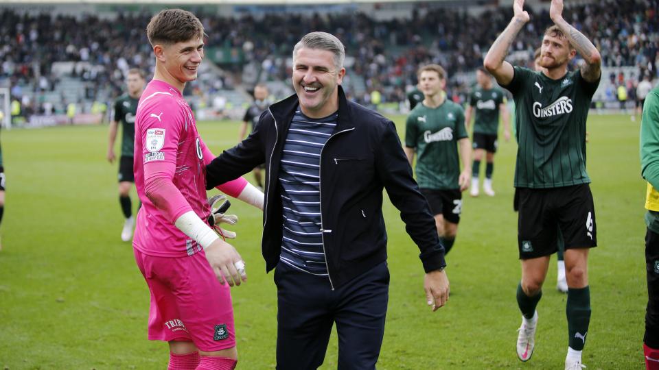 Mike Cooper and Ryan Lowe celebrate at full-time