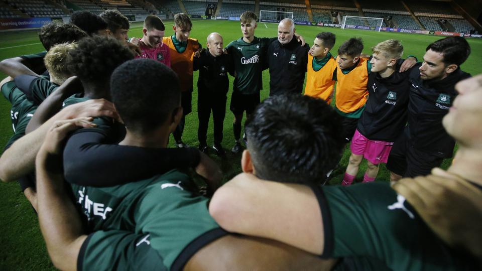 Argyle Academy players in a huddle