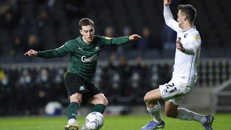Conor Grant in action at MK Dons