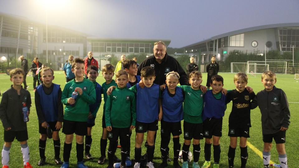 Neil Dewsnip with youngsters at Elite Coaching Hub