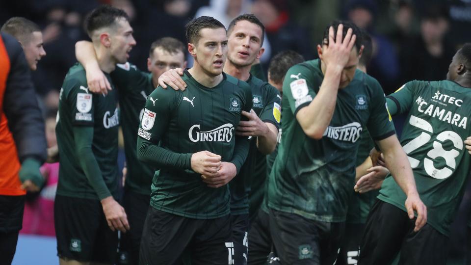 Conor Grant celebrates scoring the winner