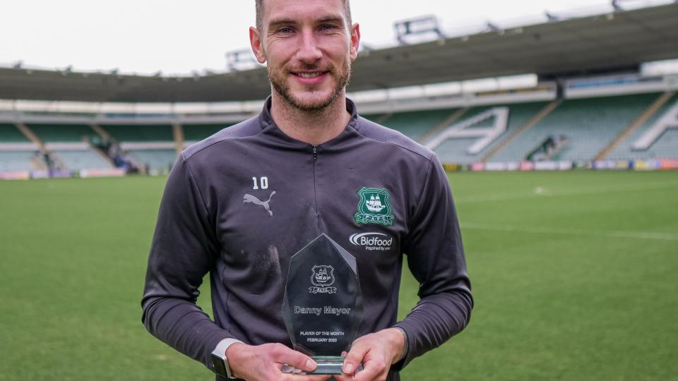 Danny Mayor with his Player of the Month award
