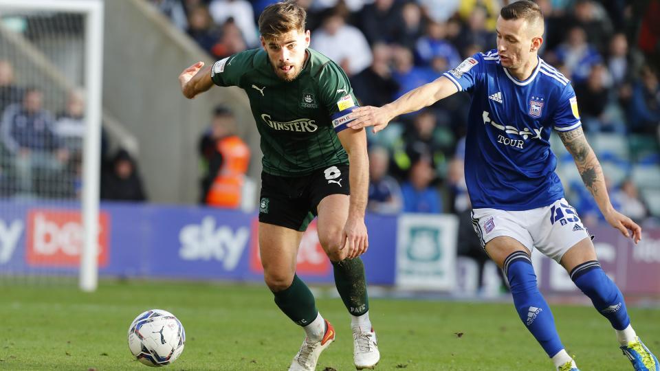 Joe Edwards battles with Ipswich player