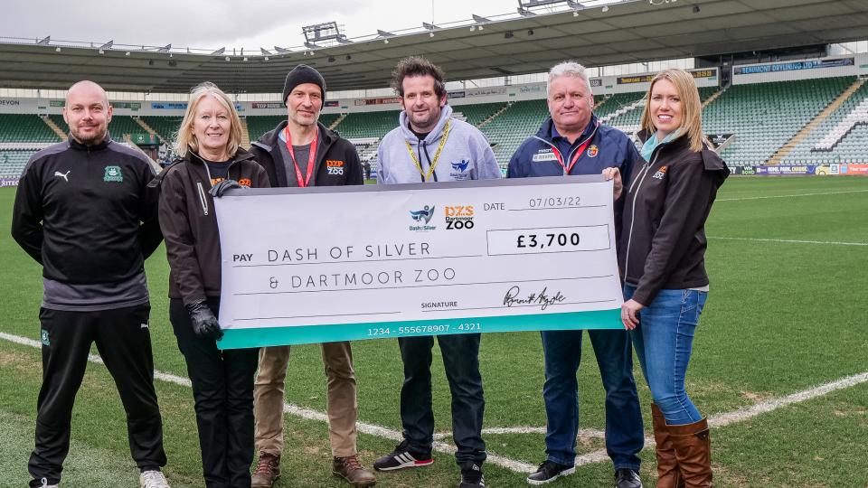Partner charities receive cheque at Home Park