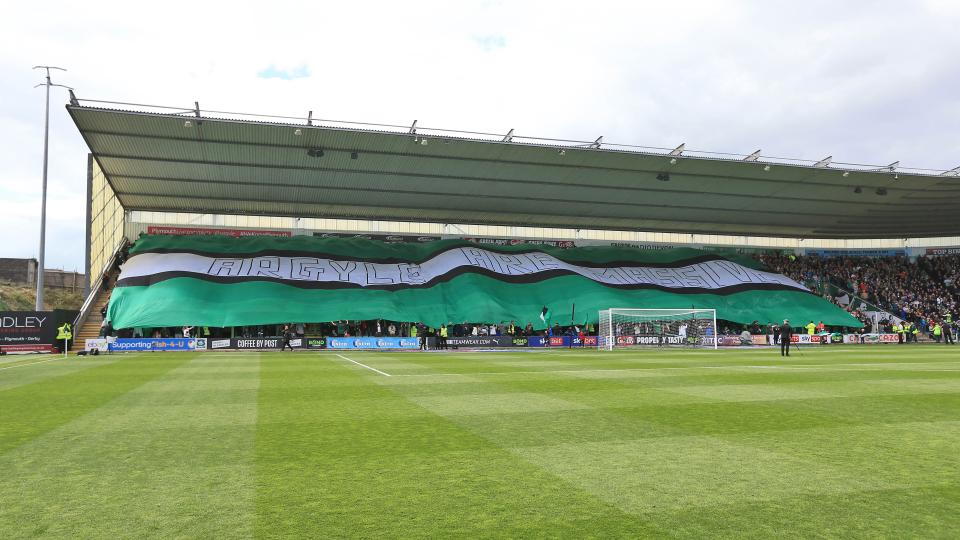 PAFC Displays flag at the Devonport End