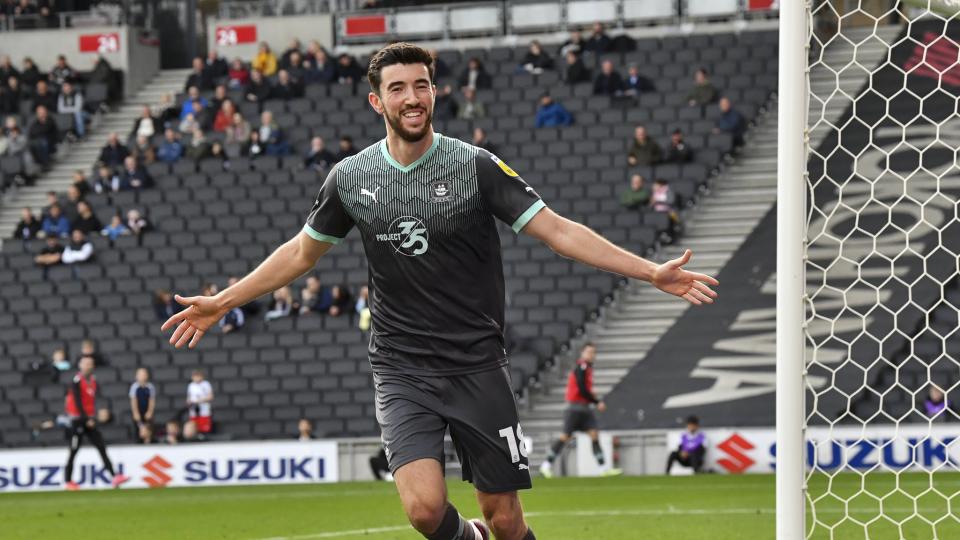 Finn Azaz celebrates scoring against MK Dons