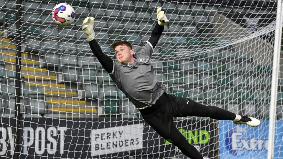 Zak Baker saves a shot in the warm up